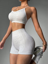 Leopard Print Criss-Cross Twist Strap Sports Bra And Shorts Yoga Set